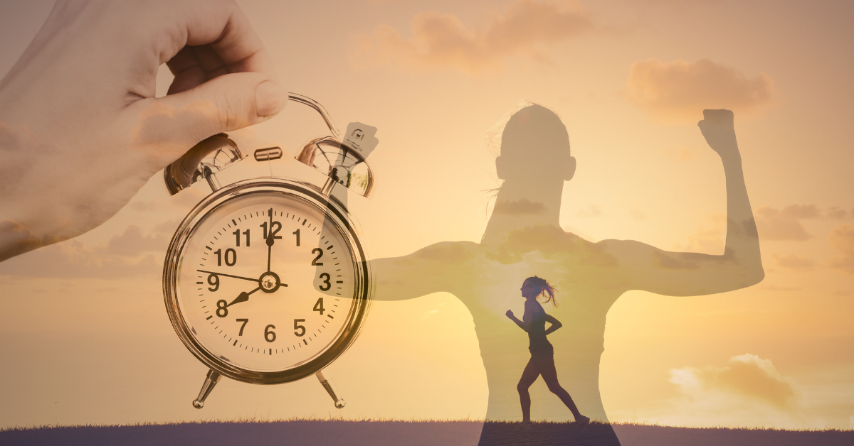 A silhouette of a woman with an alarm clock in front of her, symbolizing motivation in recovery.