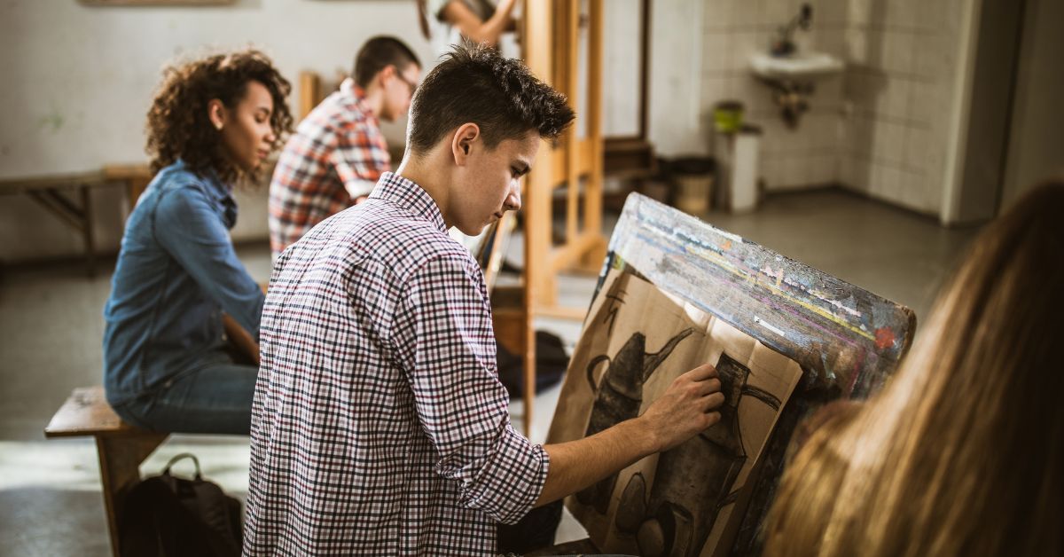 A group of people making decisions in an art studio during their recovery process.